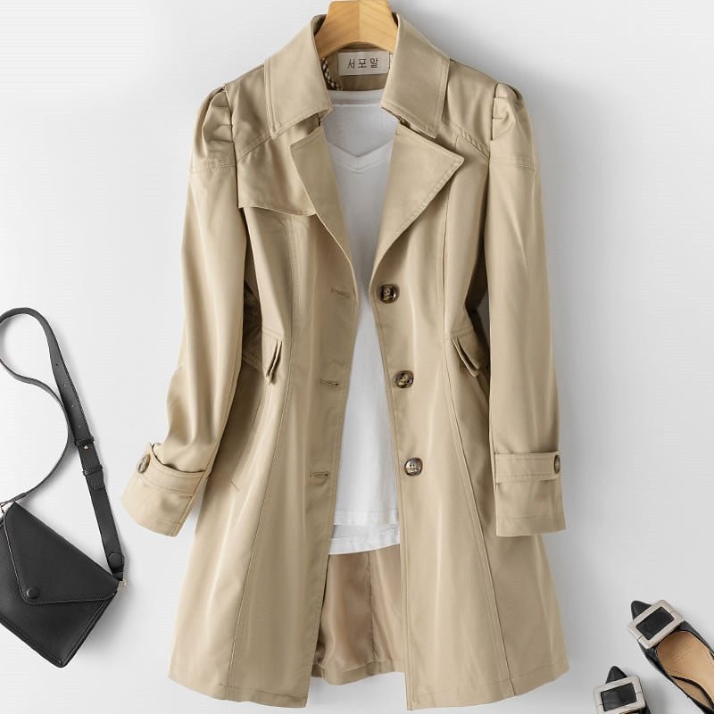 Dam lätt trenchcoat i tidlös design för alla tillfällen